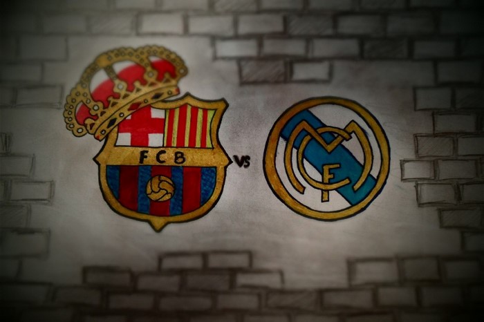 FC Barcelona and Real Madrid logos drawn on brick wall