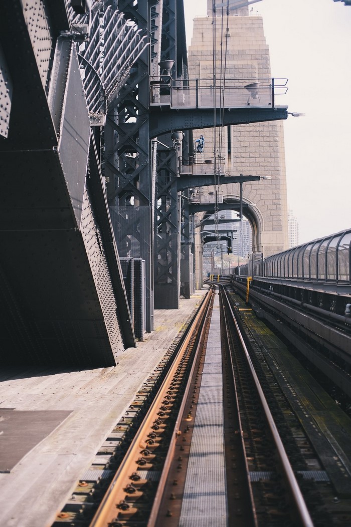 Train tracks on a large steel bridge