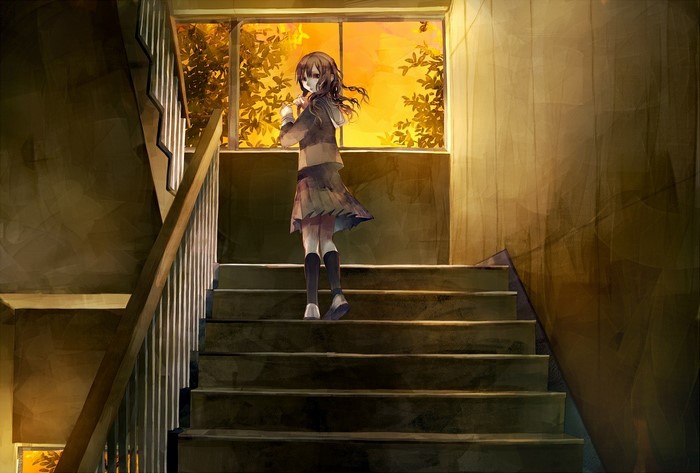 Girl in school uniform on stairs