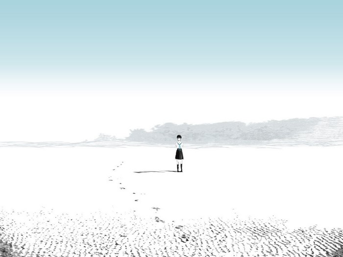 Girl in uniform standing on a sandy shore
