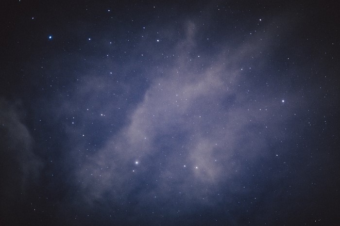 Night sky with stars and clouds