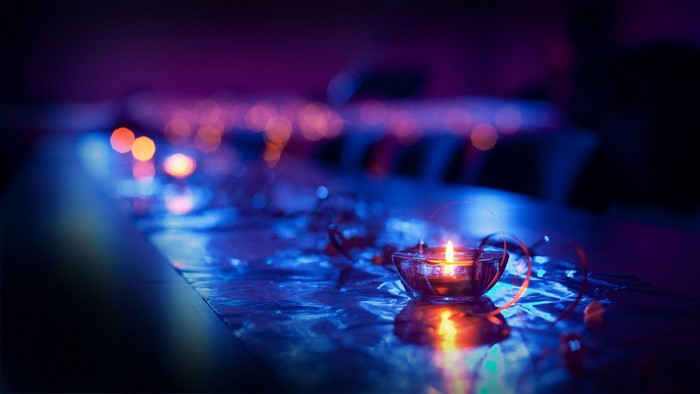 Candlelit table with bokeh lights
