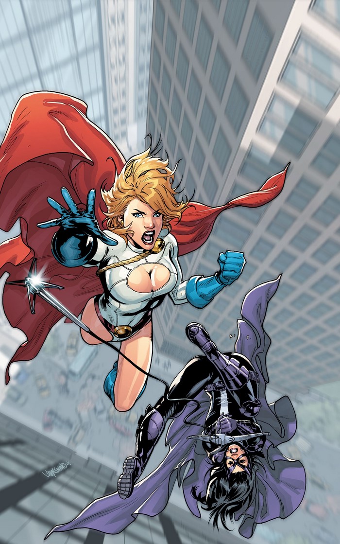 Power Girl and Huntress fighting in a city
