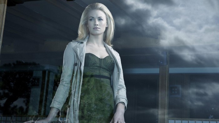 Yvonne Strahovski in a green dress and trench coat