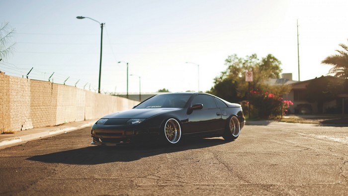 Black Nissan 300ZX sports car on asphalt