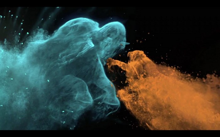 Blue and orange dust clouds colliding