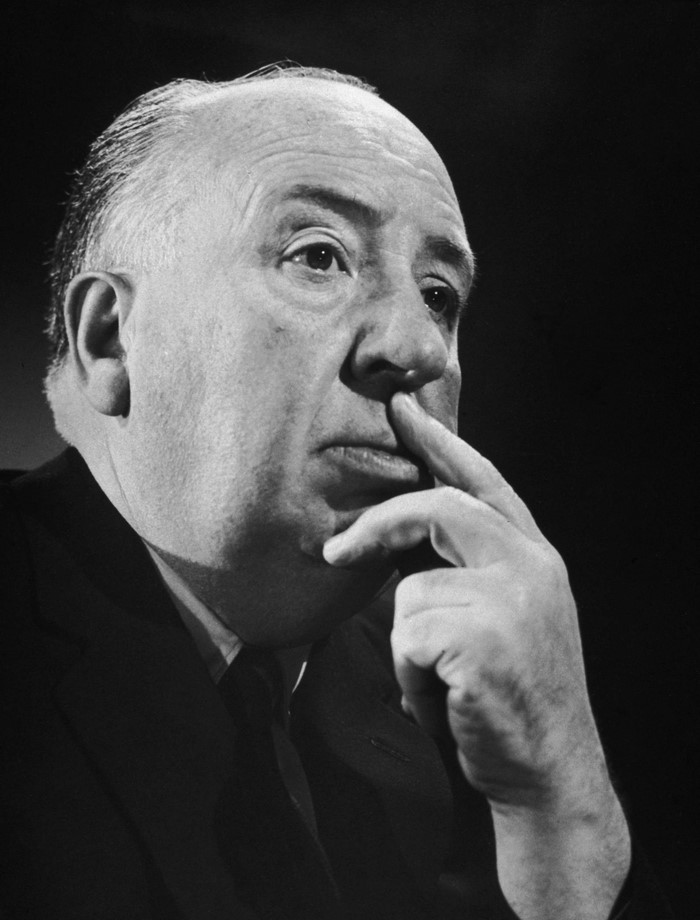 Alfred Hitchcock in a suit, close-up portrait
