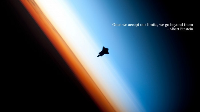 Space Shuttle Orbiting Earth with Quote