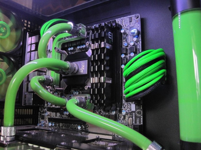 Custom PC with green water cooling and RGB fans