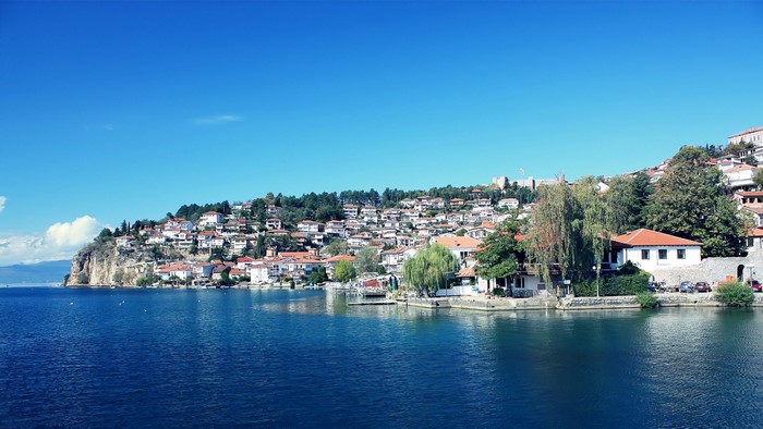 Ohrid cityscape on a hill overlooking a blue lake