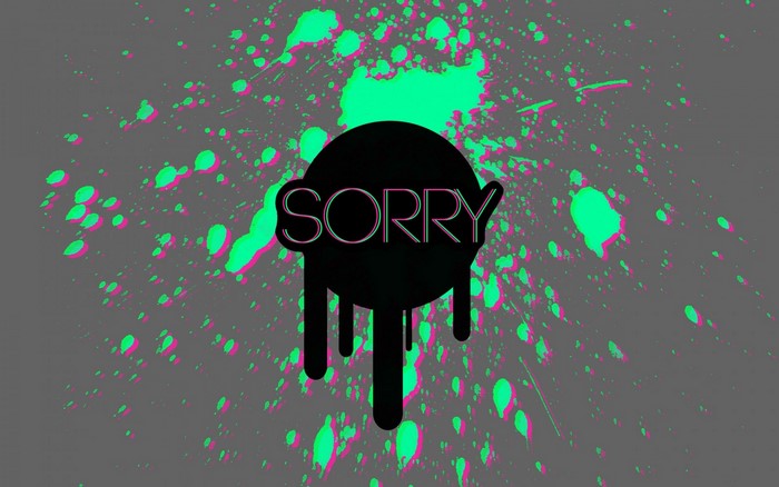 Sorry typography with paint splatter