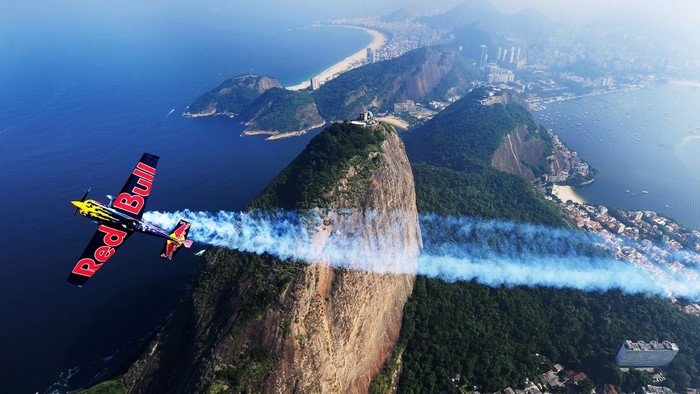 Red Bull airplane flying over Sugarloaf Mountain, Rio de Janeiro