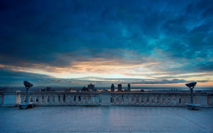 Cityscape Overlook at Dusk with Telescopes
