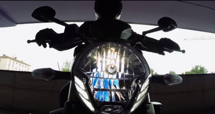 Motorcycle with LED headlight and rider