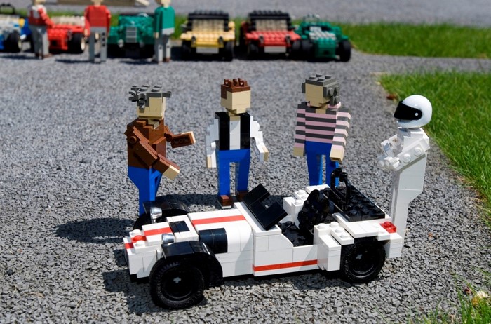 LEGO figures of Top Gear presenters and The Stig with a sports car