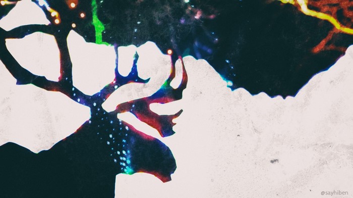 Abstract silhouette of a reindeer with colorful lights