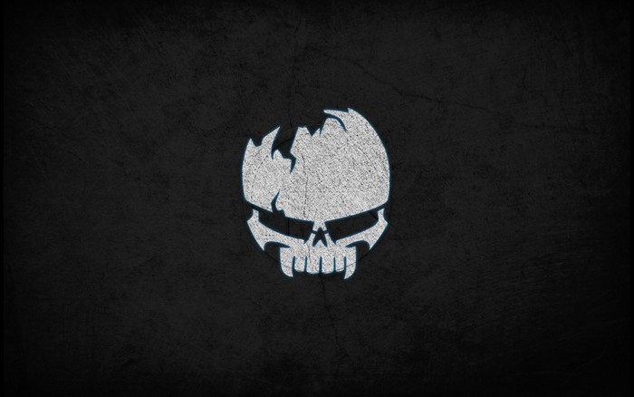 White skull logo on black background