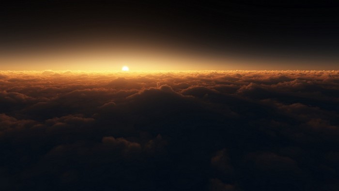 Sunset over clouds from above