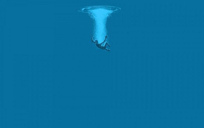 Man falling into blue water