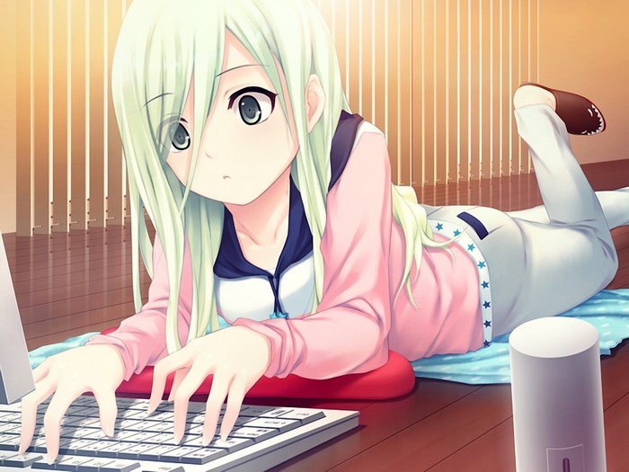 Anime girl with light green hair using a laptop