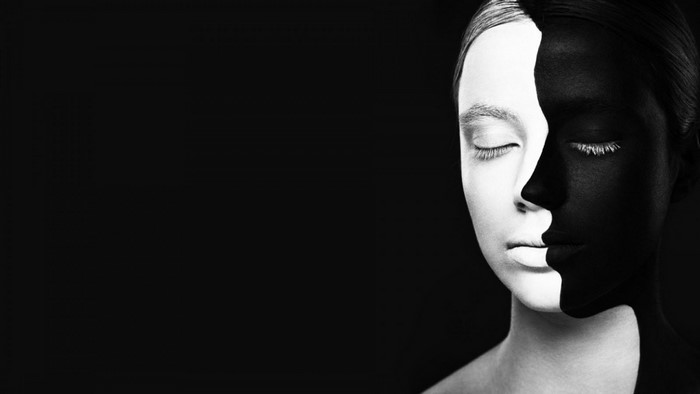 Woman with black and white face paint