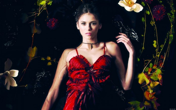 Nina Dobrev in a red dress with flowers