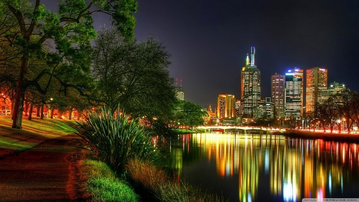 Melbourne skyline at night reflected in the Yarra River