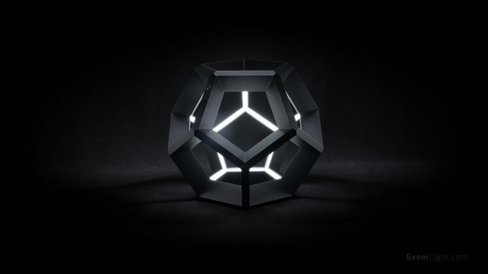 Geometric Lamp with White Light on Black Background