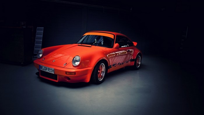 Orange Porsche 911 Carrera sports car