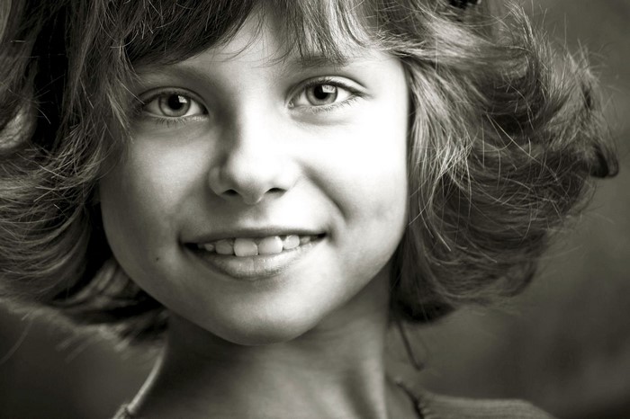 Close up portrait of a young girl smiling