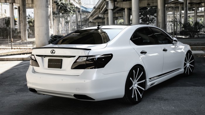 White Lexus LS with custom rims