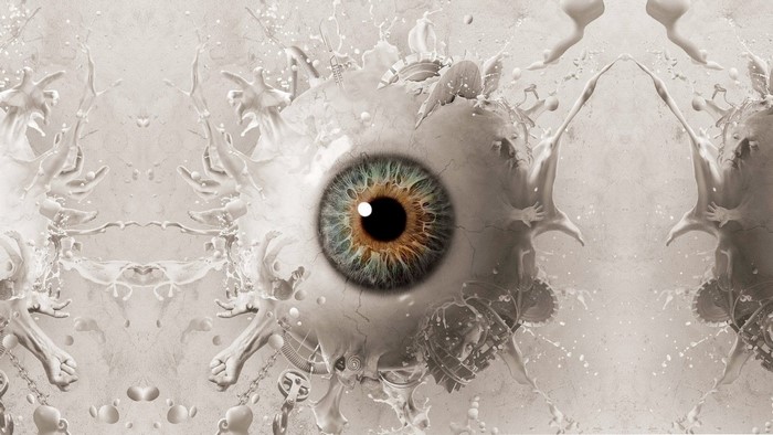 Close-up of a human eye with symmetrical abstract elements