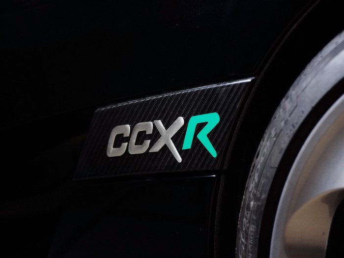 Koenigsegg CCXR badge on a black car