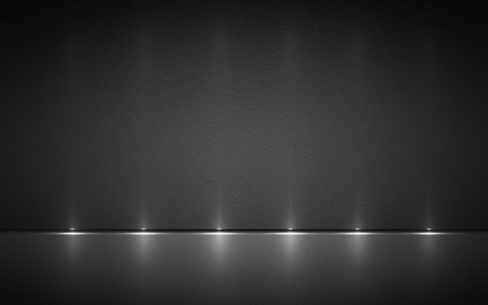 Monochrome abstract texture with light reflections
