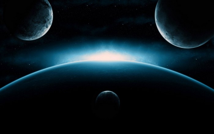 Planets and celestial bodies in deep space with glowing atmosphere