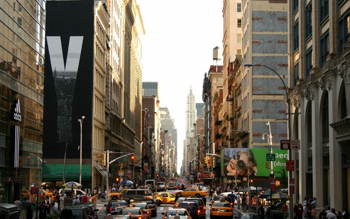 New York City street with traffic and pedestrians