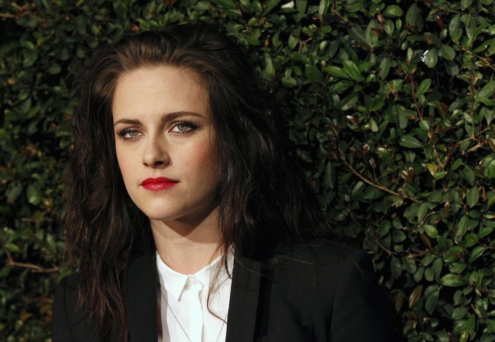 Kristen Stewart in a black blazer and white shirt