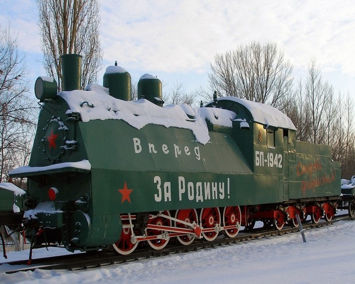 Green armored train BP-1942 covered in snow