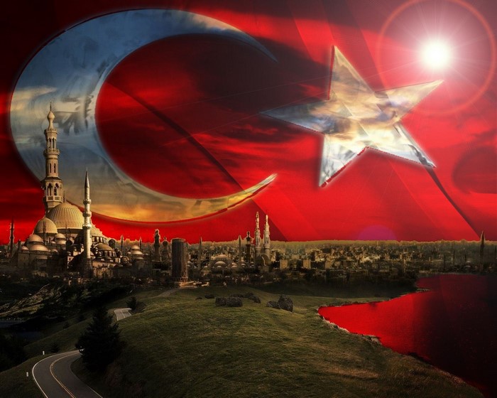 Turkey Flag Over Cityscape at Sunset