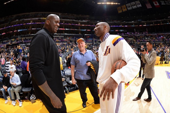 Shaquille O'Neal and Kobe Bryant on basketball court