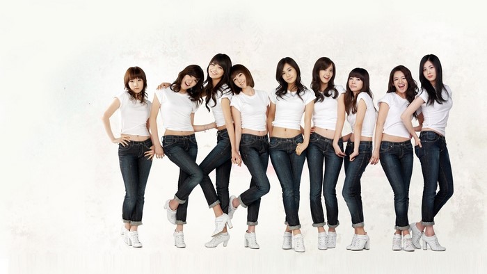 Girls' Generation Group Photo in White Tops and Jeans