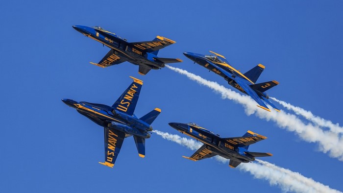 Blue Angels F/A-18 Hornets performing aerobatics
