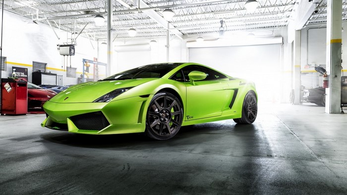 Green Lamborghini Gallardo in a garage