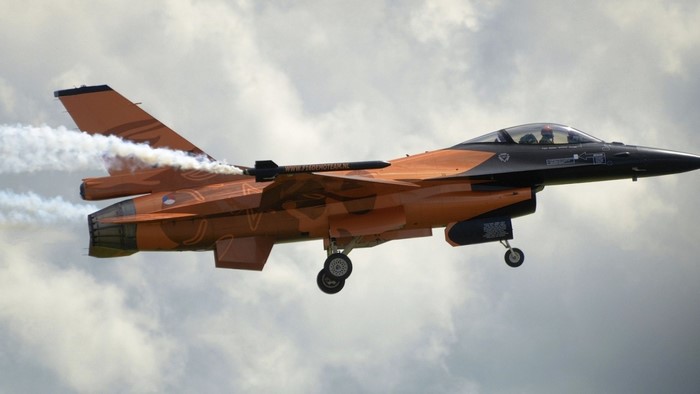 Royal Netherlands Air Force F-16 Fighting Falcon performing aerobatics
