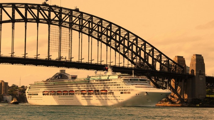 Cruise ship passing under Sydney Harbour Bridge