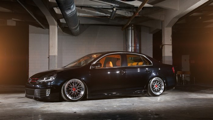 Black Volkswagen Jetta with BBS rims in garage