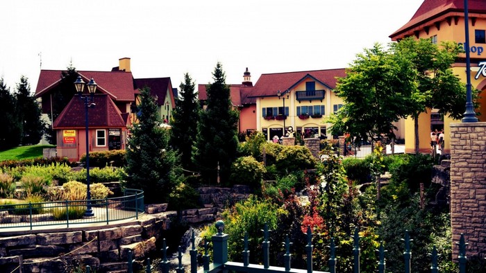 European-style village with shops and greenery