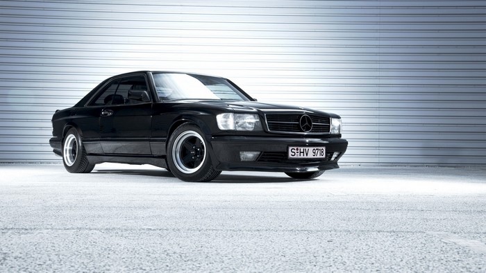 Black Mercedes-Benz W126 Coupe with custom wheels