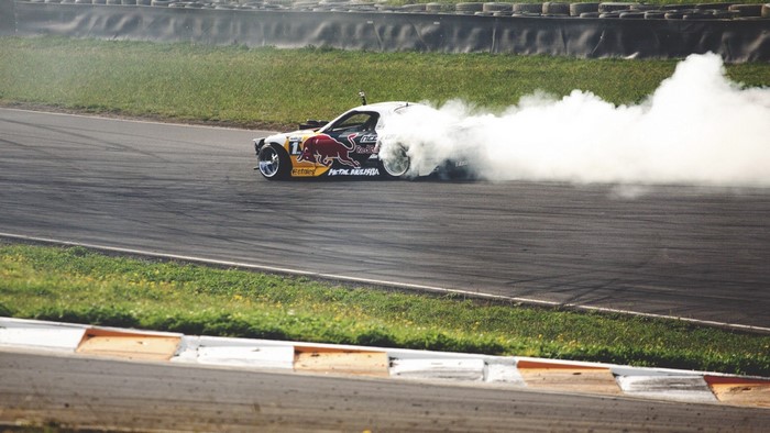 Mad Mike's Red Bull drift car on a race track