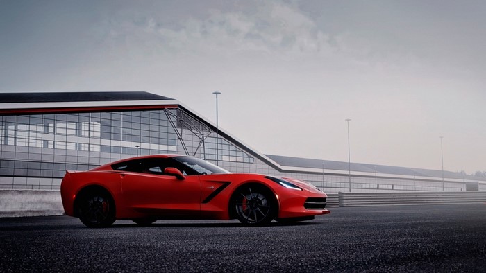 Red Chevrolet Corvette C7R on asphalt